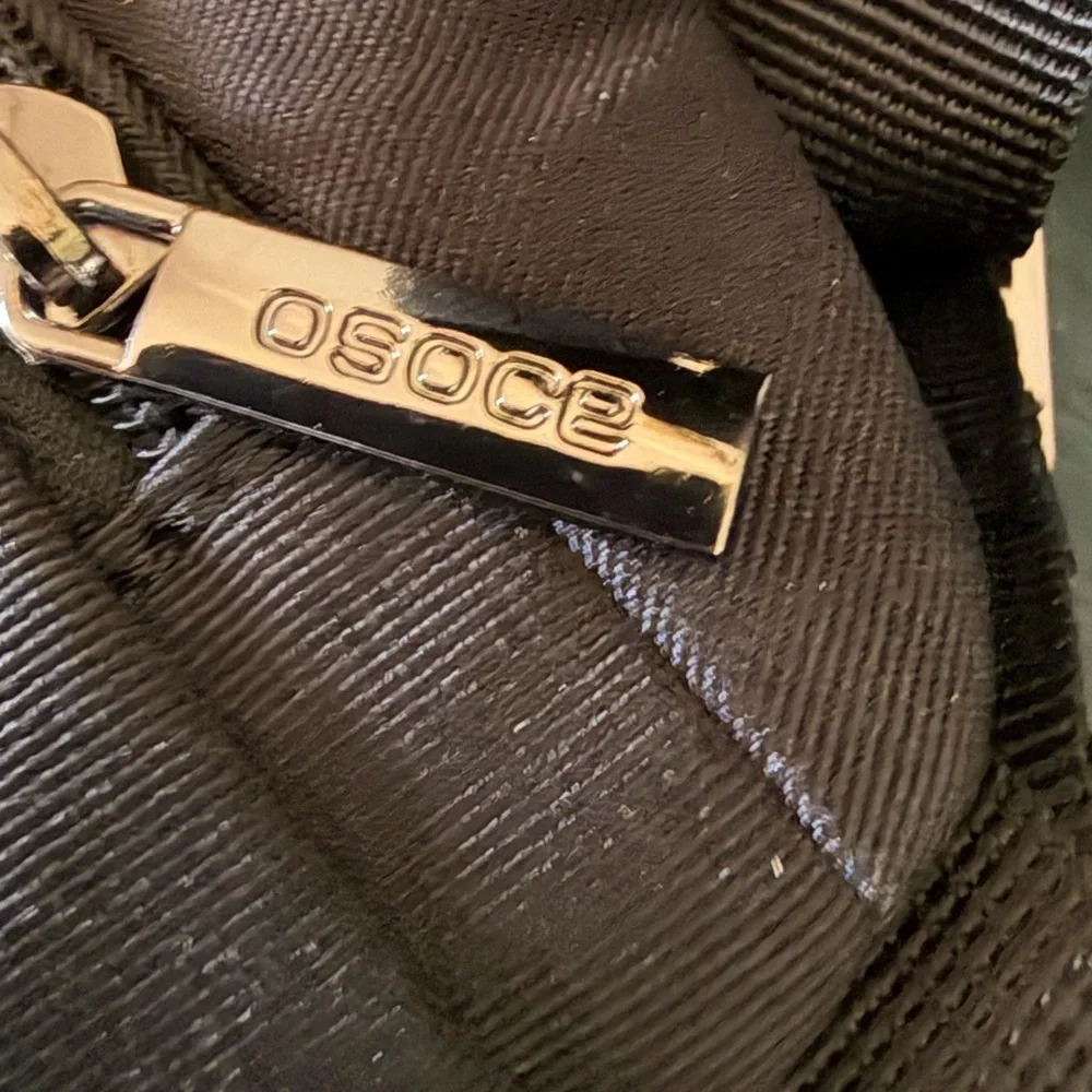 OSOCE anti-theft waterproof crossbody sling bag for travel and daily use.